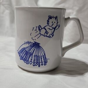 White Mug with Blue Cat Design